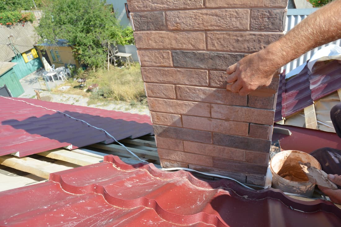 Repointing a weathered brick chimney stack